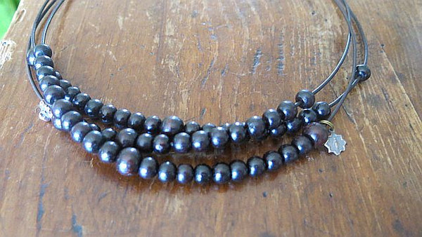 Sandalwood Rosary Necklace, 3 strand on leather